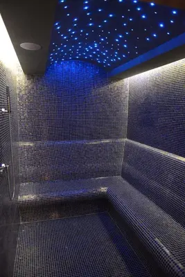 a bathroom with a shower with blue lights on the ceiling at Berjer Boutique Hotel & Spa in Istanbul