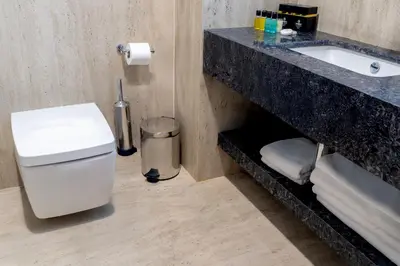 a bathroom with a toilet and a sink at Berjer Boutique Hotel & Spa in Istanbul