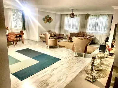 a living room with couches and a table at forest villa, breakfast hotel, 6 minutes from Istanbul airport in Arnavutköy