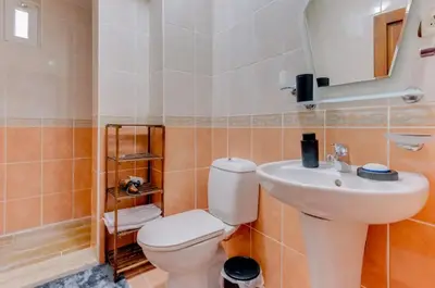 a bathroom with a toilet and a sink at Villa Sapanca in Sapanca