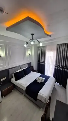 a bedroom with a large bed in a room at RAMOS İSTANBUL OLD CİTY CENTEr in Istanbul