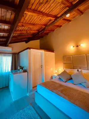 a bedroom with a large bed in a room at Niceland İznik