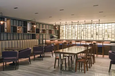 a restaurant with tables and chairs in a room at Bof Hotels Business in Istanbul