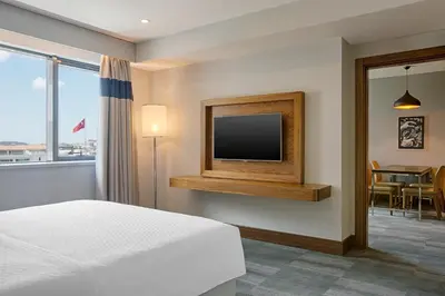 a hotel room with a bed and a television at Bof Hotels Business in Istanbul