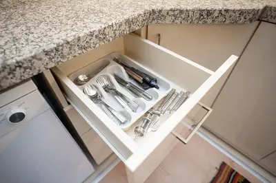 a kitchen sink with silver utensils in a drawer at Dublex 3 Bedrooms&2Bathrooms &Terrace in Istanbul