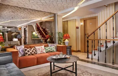 a living room with a couch and a table at Almina Guest House in Istanbul