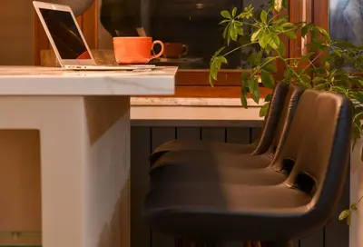a desk with a laptop computer sitting on a table at chic ve modern daire taksim meydani in Istanbul