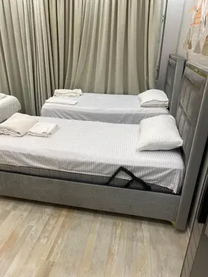 two beds sitting next to each other in a bedroom at lastbest hotel in Istanbul