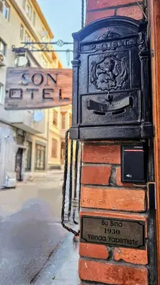 an old fashioned stove sitting on the side of a street at MAHZEN Otel in Istanbul