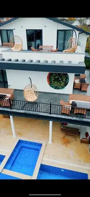 an aerial view of a building with a swimming pool at Parna Sapanca Hotel in Sakarya