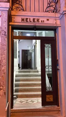 an entrance to a building with a glass door at Taksim Green Flat Apartment in Istanbul