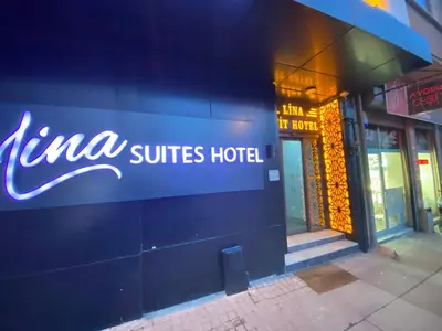 a hotel sign on the side of a building at Lina Suit Hotel in Istanbul