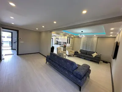 a living room with two couches and a tv at Lux Villa Silivri Kavakli in Silivri