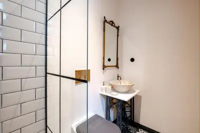 a bathroom with a sink and a shower at Cozy Flat with Balcony Near Istiklal Avenue in Istanbul