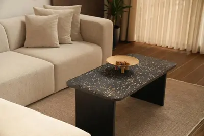 a living room with a couch and a coffee table at Cevizdibi Loft Villa in Kartepe