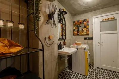 a bathroom with a sink and a toilet and a sink at Cosy Apartment in Beyoglu in Istanbul