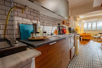 a kitchen with a sink and a counter top at Cosy Apartment in Beyoglu in Istanbul