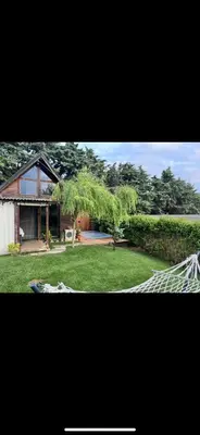 a view of a house and a yard with a house at Galaxy Housing