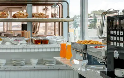 a buffet line with food in a restaurant at Adamar Hotel-Special Category in Istanbul