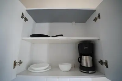 a kitchen with a coffee maker and a coffeemaker at i1 Historic House Hotel with Gorgeous View in Istanbul