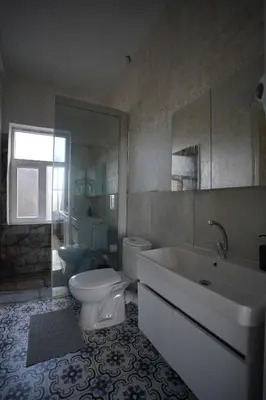 a bathroom with a toilet and a tub and a sink at i1 Historic House Hotel with Gorgeous View in Istanbul