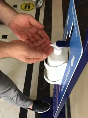 a person is holding a tool in a box at Dencity Hotels & Spa in Istanbul