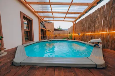 a swimming pool in the middle of a house at Sapanca Villa Şen 2 in Sapanca