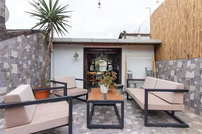 a patio with chairs and a table and a table at 3BR Villa with Garden & Terrace in Kadikoy in Istanbul