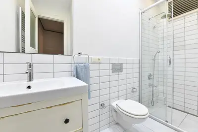 a bathroom with a toilet and a sink and a shower at Charming Flat Retro Design AC Galata in Istanbul