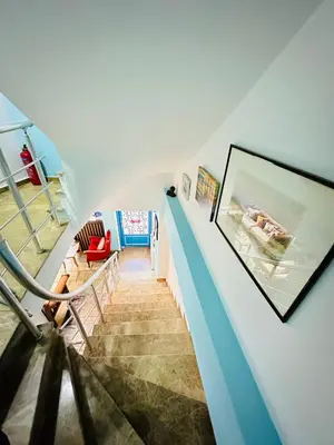 a staircase in a room with a stair case at LA MAİSON FAMILY Hotel in Istanbul