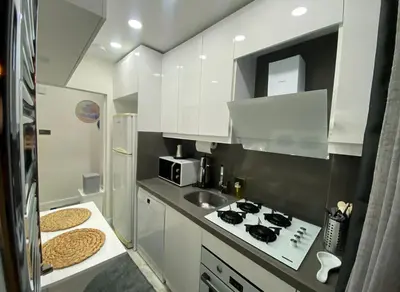 a small kitchen with a stove and a sink at Apartment - Little Hagia Sophia in Istanbul