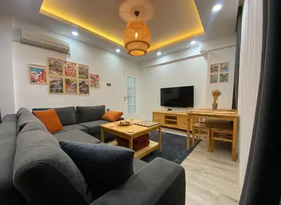 a living room with a couch and a television at Apartment - Little Hagia Sophia in Istanbul