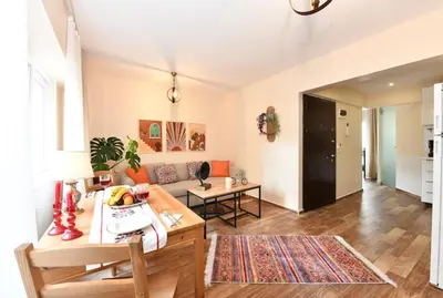 a living room with a couch and a table at Comfortable Bright Home AC Galata in Istanbul