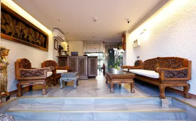 a living room with couches and chairs and a table at Galata Fil Hotel in Istanbul