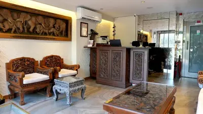 a living room with two chairs and a table at Galata Fil Hotel in Istanbul