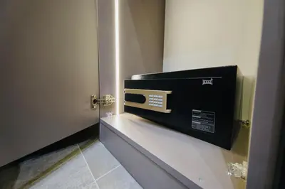 a box is sitting on a shelf in a door at Taksim Square 1 plus 1 fully equipped air conditioned luxury apartment in Istanbul