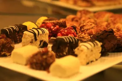 a tray of desserts on a plate on a table at Molton Monapart Mecidiyekoy in Istanbul
