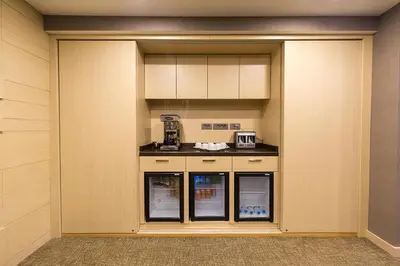 a room with a kitchen with a counter in it at Molton Monapart Mecidiyekoy in Istanbul