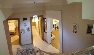 a room with a staircase leading to a bedroom at family villas sapanca in Sapanca