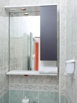 a bathroom with a mirror and a sink at Apartment Taksim-Beyoğlu 2 in Istanbul
