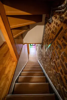 a staircase leading up to a brick wall at Mercan Apartments Balat-The Bay in Istanbul