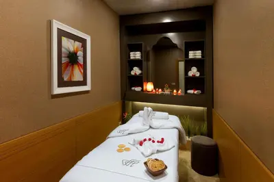 a room with two beds and a painting on the wall at Ferman Hilal Hotel-Special Category in Istanbul