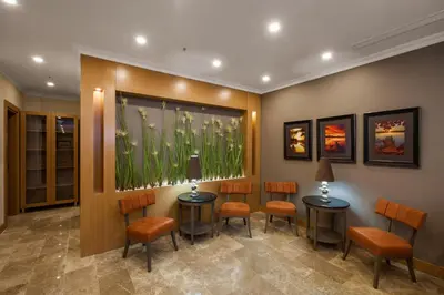 a waiting room with two tables and chairs at Ferman Hilal Hotel-Special Category in Istanbul