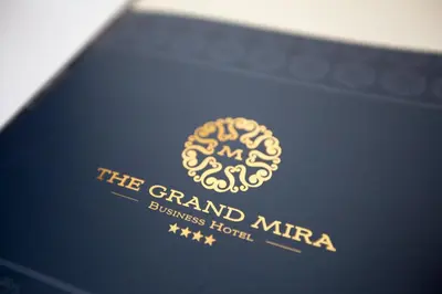 a logo for the grand mira business hotel at The Grand Mira Business Hotel in Istanbul