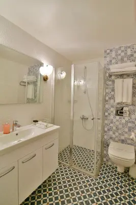 a bathroom with a shower and a sink and a toilet at Istanbul Life Hotel in Istanbul