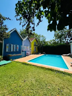 a swimming pool in the yard of a house at Sapanca Bizim Konak in Sapanca