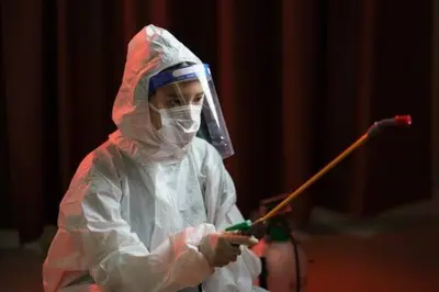 a person dressed in protective gear playing a musical instrument at Wooden Style AC Galata in Istanbul