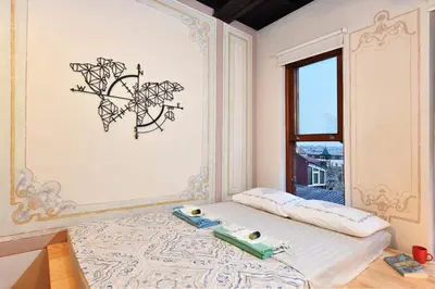 a room with a bed and a window at Historical Flat Unique Terrace AC in Beyoğlu Galata in Istanbul