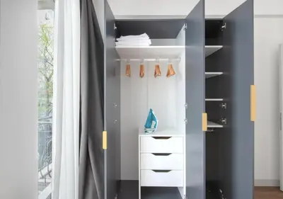 a closet with a white dresser and a curtain at Elegant & Charming Apartment in Beyoglu in Istanbul