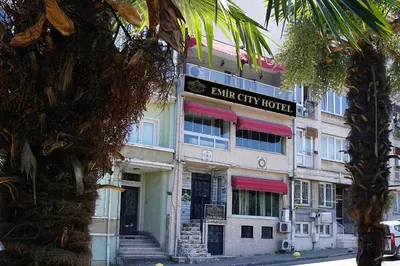 a building with a sign that reads bank city hotel at Emir City Hotel in Bursa